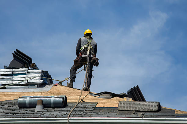 Professional Roof Replacement technician working in Fishtail, MT